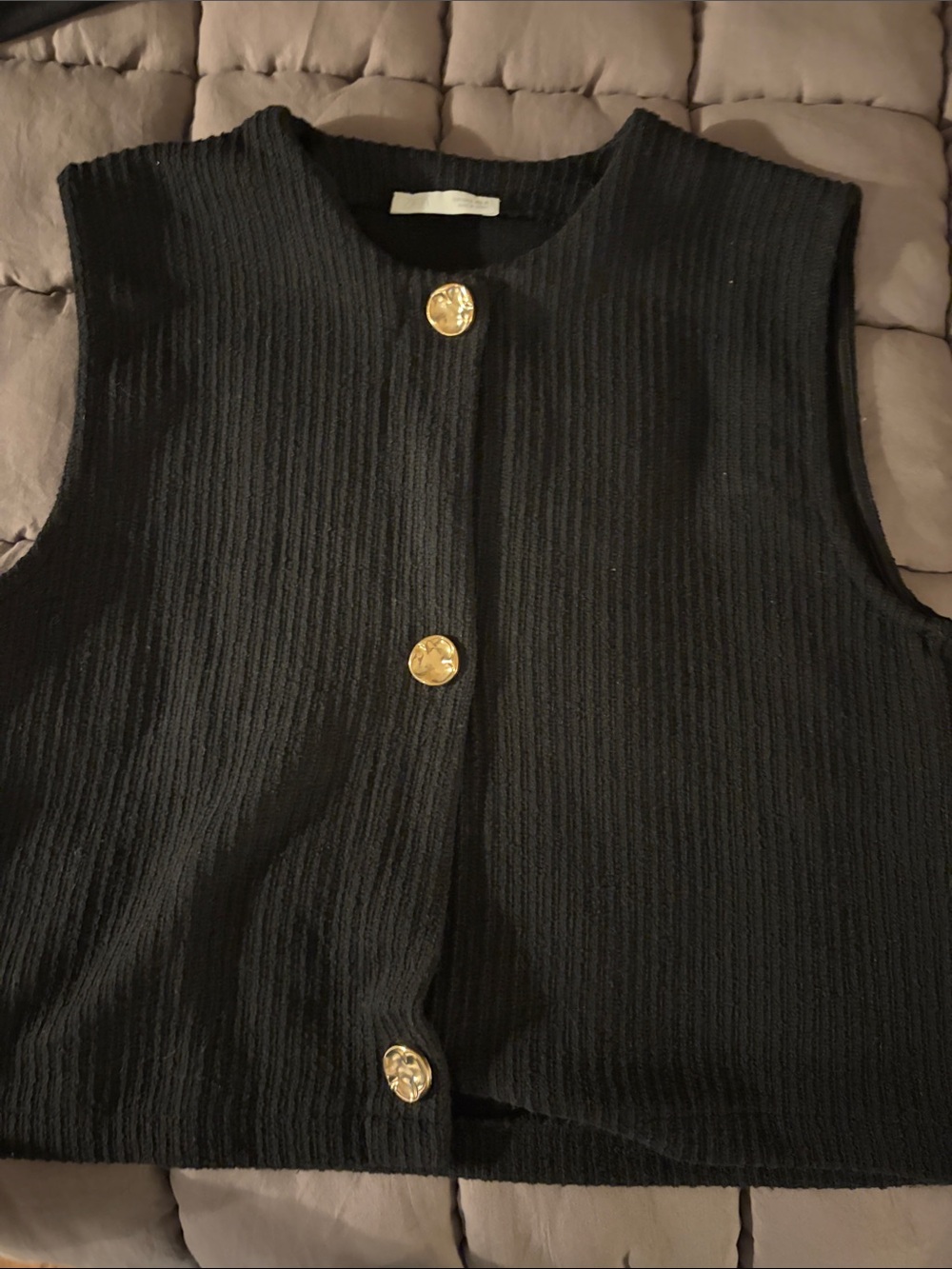 Classic Black Sleeveless Knit Top with Gold Buttons